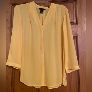 Investments Yellow Blouse